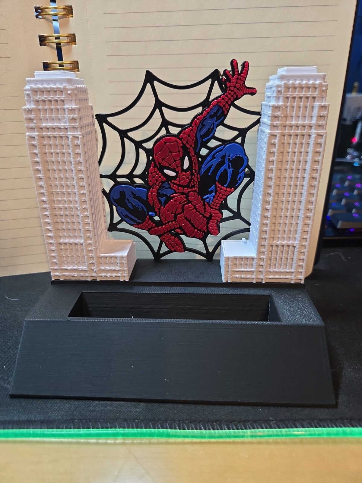 Spiderman between two buildings-min